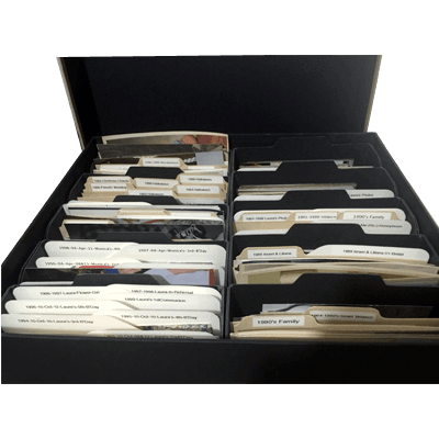 Organized photo storage boxes with labels